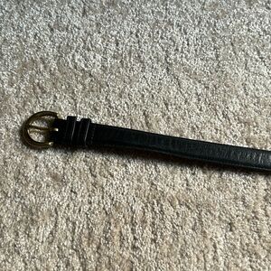 Coach black thin leather belt in great condition. 38” long